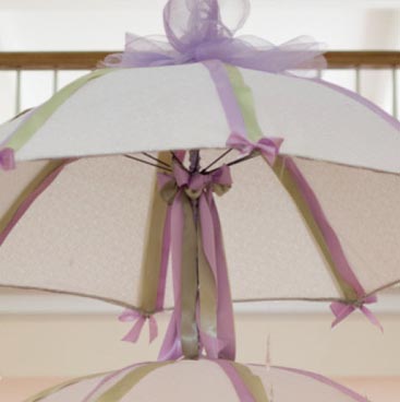 Purple detail of hanging umbrella centerpieces from a wine tasting bridal shower; Boston Event Planner, Boston Event Planning, Boston Event Stylist, Boston Event Styling