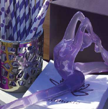 Purple detail of lavendar yoga statuette used as a nakin ring from a Vinyasa and Vino yoga party; Boston Event Planner, Boston Event Planning, Boston Event Stylist, Boston Event Styling