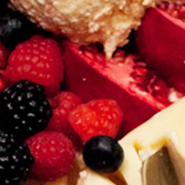 Red detail of a fruit plate from a corporate holiday party; Boston Event Planner, Boston Event Planning, Boston Event Stylist, Boston Event Styling