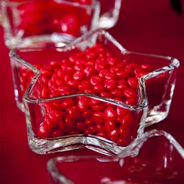 Red detail of a candy bowl with red candies from a Fourth of July celebration; Boston Event Planner, Boston Event Planning, Boston Event Stylist, Boston Event Styling