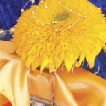 Yellow detail of a fresh flower napkin ring from a Van Gogh High Tea event; Boston Event Planner, Boston Event Planning, Boston Event Stylist, Boston Event Styling