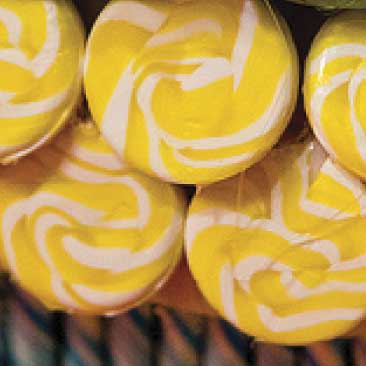 Yellow detail of candy lollipops from a Fashionista Bat Mitzvah; Boston Event Planner, Boston Event Planning, Boston Event Stylist, Boston Event Styling