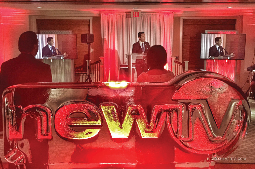 NewTV Media Awards Anniversary Gala, ice sculpture of the NewTV logo in front of a live presentation, Boston Event Planner, Boston Event Planning, Boston Event Stylist, Boston Event Styling